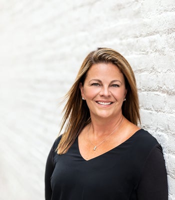 Portrait of Christin Dewar, Affiliate Broker.